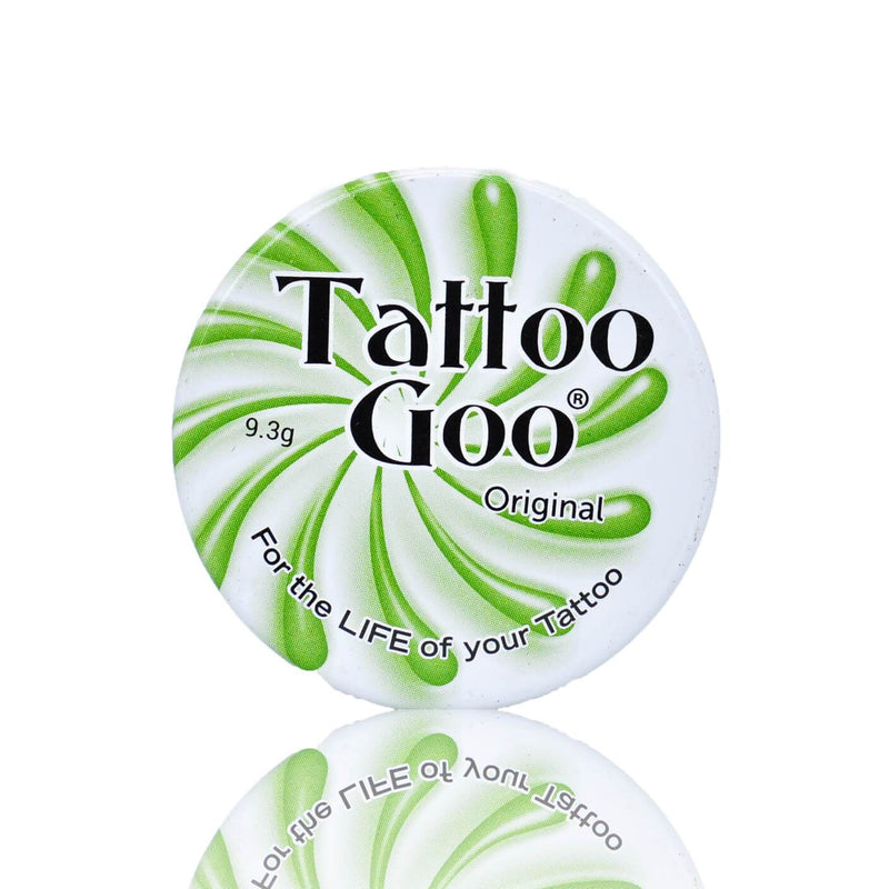 Close-up of a small container of Tattoo Goo Aftercare Salve